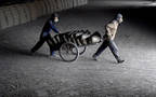 Cement workers (Photo Credit: Arabianeye-Reuters)
