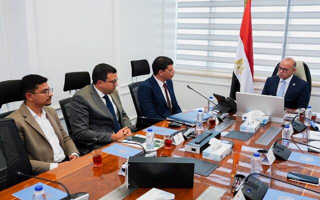 محمد فريد صالح وزير الاستثمار وفريق عمل شركة "EVRAID"