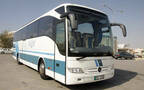 إحدى الحافلات السياحية لنقل السائحين بالشركة