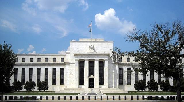 Fed chairman commits to raising interest rates