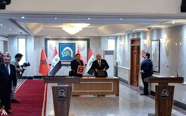 وزير الخارجية العراقي فؤاد حسين مع نظيره المغربي ناصر بوريطة