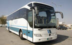 إحدى الحافلات السياحية لنقل السائحين بالشركة