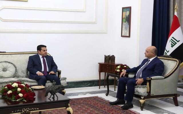 رئيس العراق برهم صالح ومستشار الأمن القومي قاسم الأعرجي