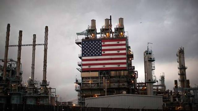 US crude stockpiles drop as oil futures rise