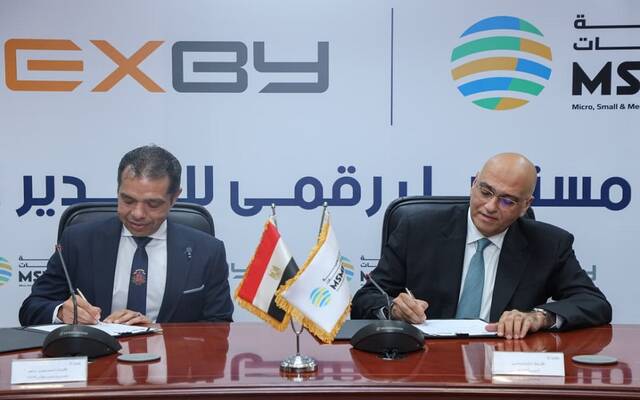باسل رحمي الرئيس التنفيذي لجهاز تنمية المشروعات وأحمد عتلم مؤسس ورئيس مجلس إدارة شركة EXBY