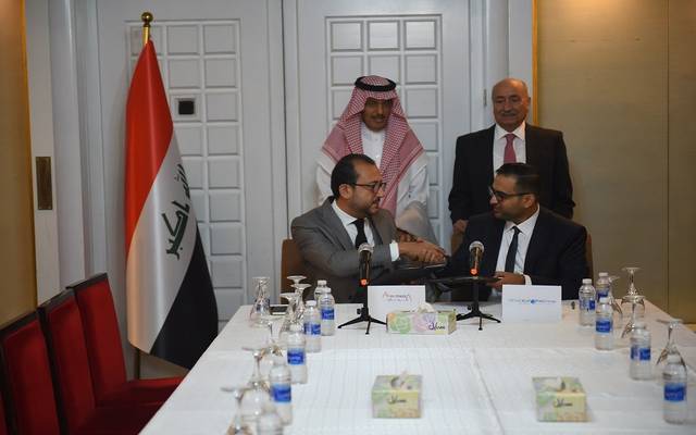جانب من توقيع أكوا باور السعودية مذكرة التفاهم مع معهد العراق للطاقة العراقي