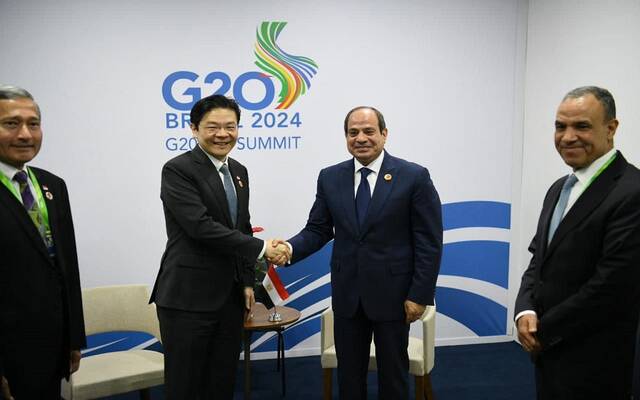 الرئيس المصري عبد الفتاح السيسي ورئيس وزراء سنغافورة لورانس وونج