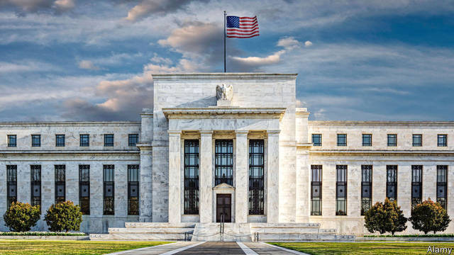 Fed holds interest rates, pledges to closely monitor economy