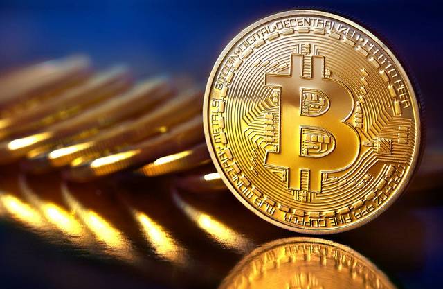 Bitcoin leaps above $7,000 amid crypto rally