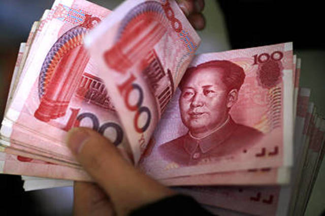 China sets yuan exchange rate at 4-year low
