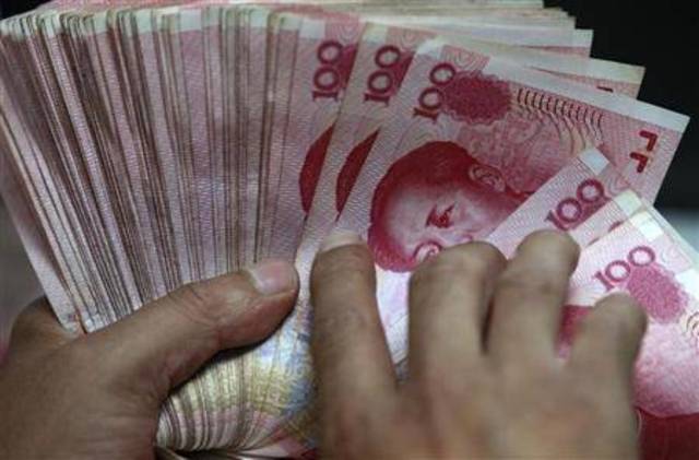 المركزي الصيني يسعى للمحافظة على سعر عملته دون تغير