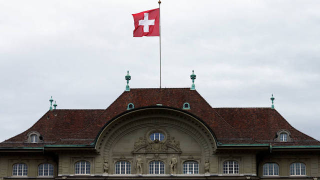 Swiss C.bank leaves interest rates unchanged, trims inflation outlook