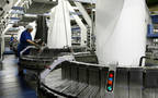 صناعة الملبوسات الجاهزة أحد أنشطة الشركة - الصورة من رويترز أريبيان آي