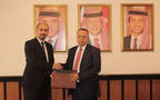 جانب من توقيع اتفاقية بين الشركة الاردنية لإعادة تمويل الرهن العقاري والعربية الوطنية للتأجير