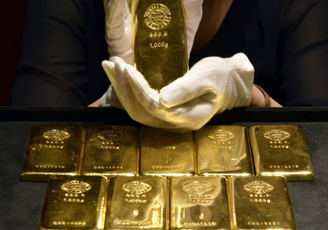 Gold stabilises as dollar softens, trade hopes boost risk-on sentiment