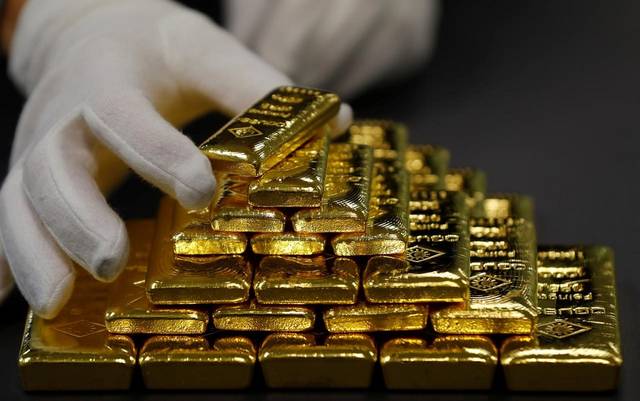 Gold climbs amid global growth concerns, US-EU trade feud