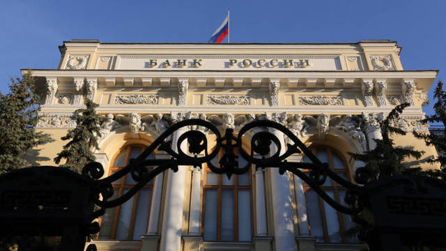 Russia C.bank cuts policy rate, hints more monetary loosing