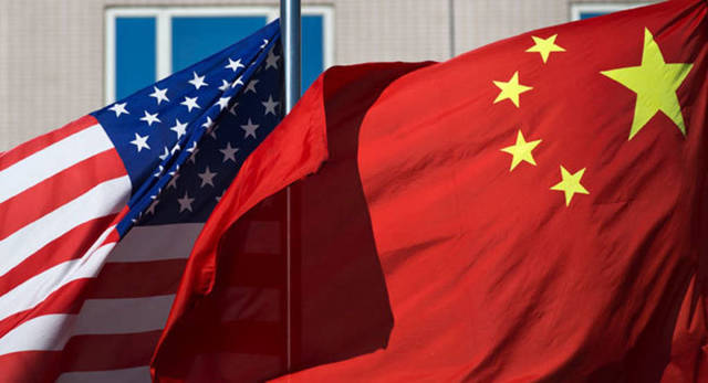 US, China officials reiterate commitment to trade deal