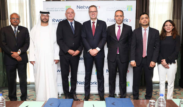 "دبي التجاري" يوقع اتفاقية مع "نتورك إنترناشيونال"