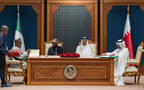 أثناء توقيع الاتفاقيات بين الجانبين قطر ونيجيريا