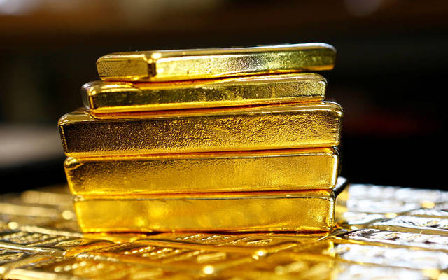 Gold down to 2-week low amid higher US stocks
