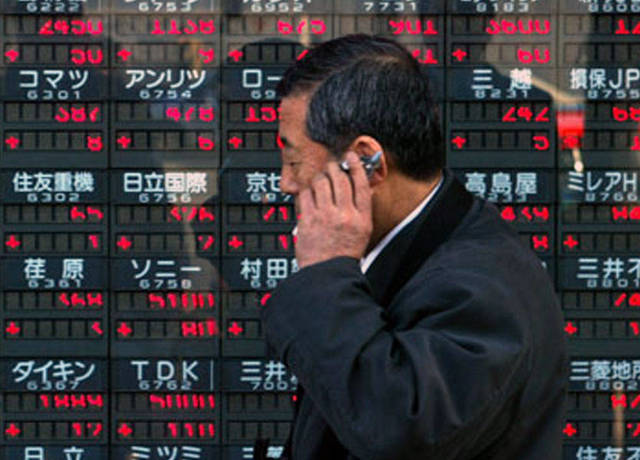 Japan’s stocks tumble on world markets' losses