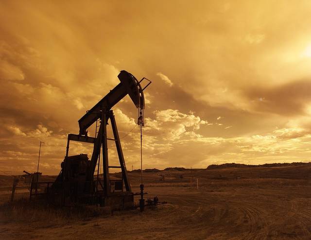 Oil stabilises on potential output hike, before US rig data