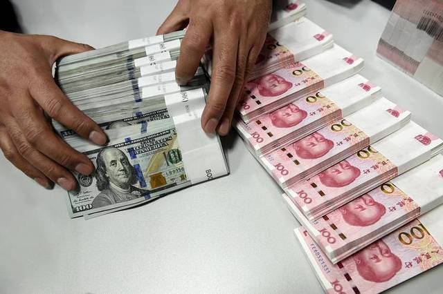 China’s yuan hits 11-yr low as US-China trade conflict escalates