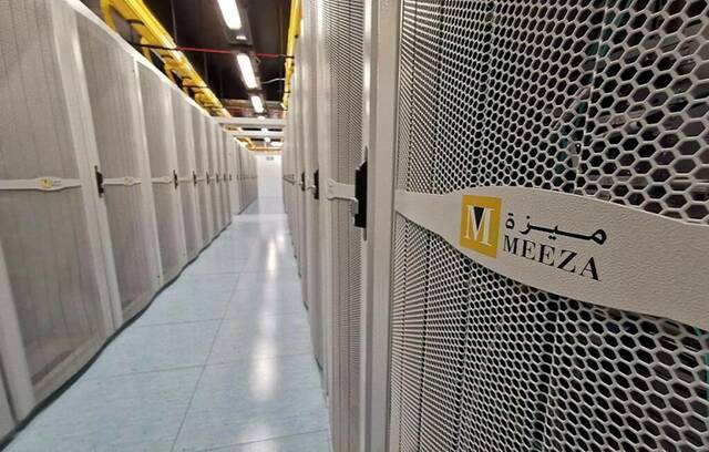 شركة "ميزة كيو إس تي بي"