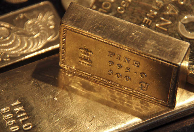 Gold gains on support from trade jitters, rate cut prospects