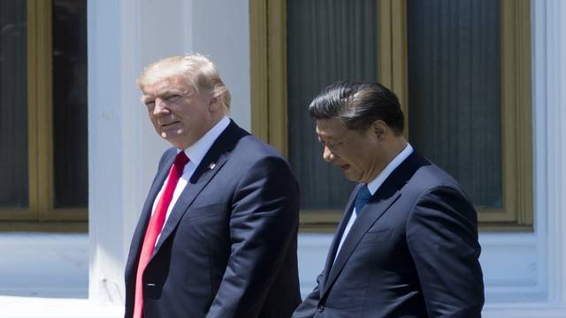 China calls on Washington to hold trade talks in Beijing
