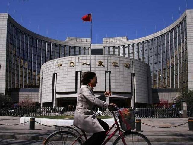 China’s yuan midpoint guidance rate set past 7-per-dollar